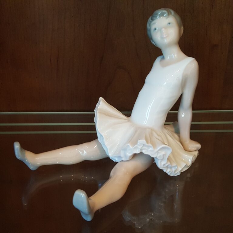 Vintage NAO by Lladró porcelain ballerina figurine in seated pose with white tutu, made in Spain