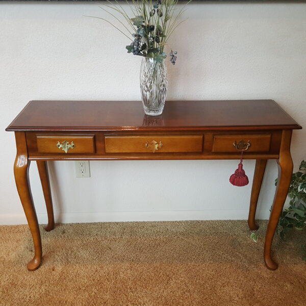 Cabriole-Leg Entry Table with Three Drawers, 48″ Cherry Finish