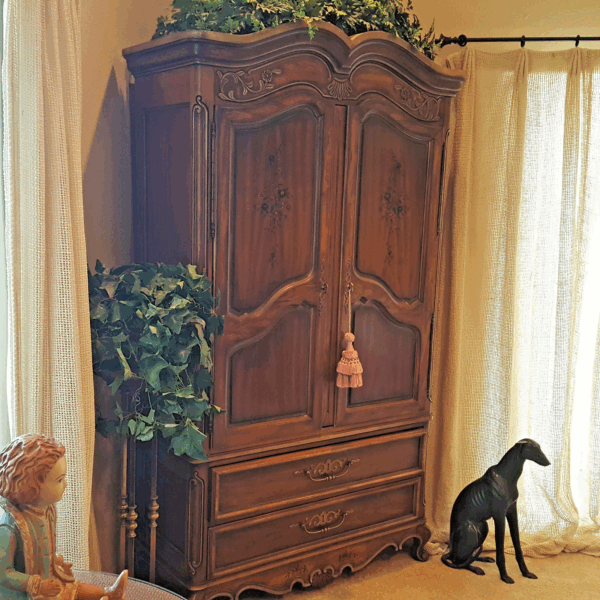 French Provincial Elegance – Carved Wood Armoire with Four Drawers & Hidden Media Storage