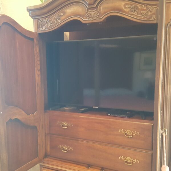 French Provincial Elegance – Carved Wood Armoire with Four Drawers & Hidden Media Storage - Image 8